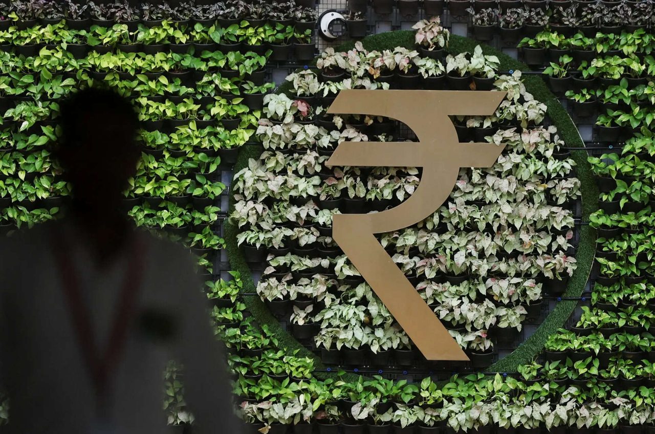 Rupee gains on state bank dollar sales and easing crude prices