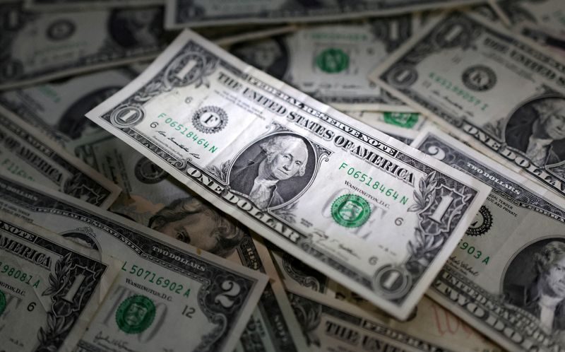 Dollar climbs after Warsh comments, poised for weekly gain