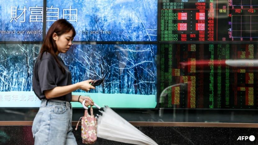 Most stocks rise as Fed hikes and indicates drive to curb inflation