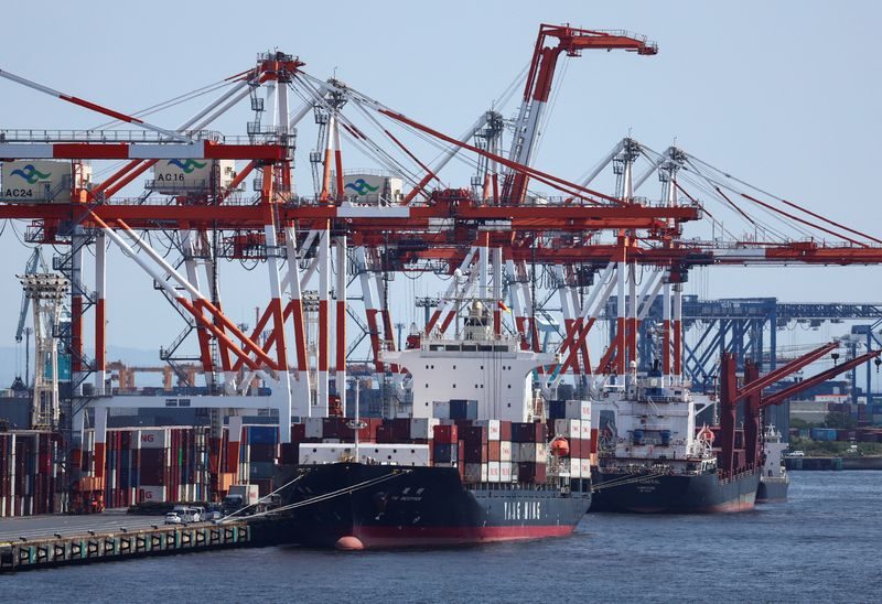 Japan's exports surge on chips demand, imports hit record on oil costs