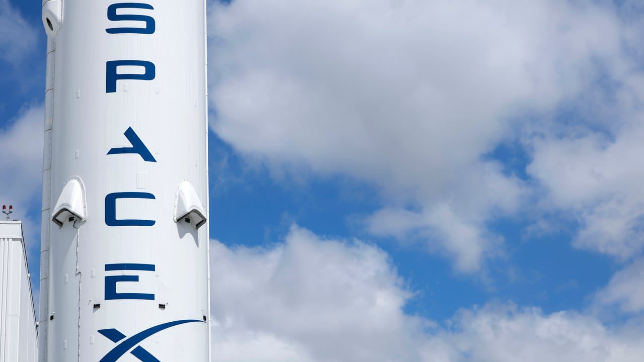 SpaceX stock slides toward $135 IPO price after Nasdaq debut