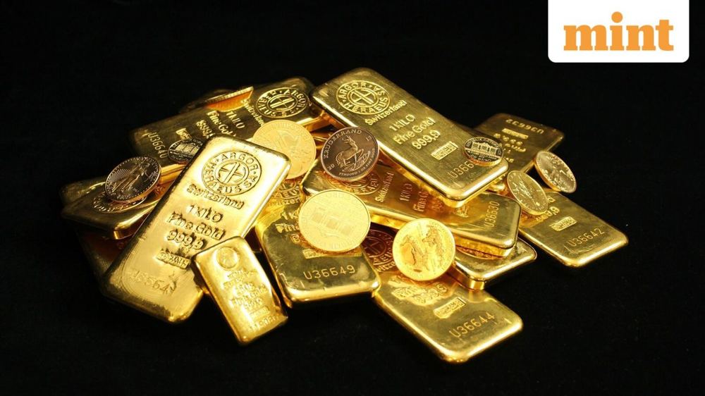 MCX gold rises on dollar dip as global prices fall on rate hike bets