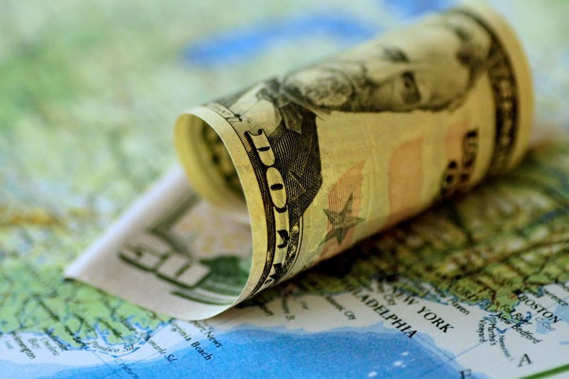 Dollar softens as bond market steadies ahead of Fed minutes
