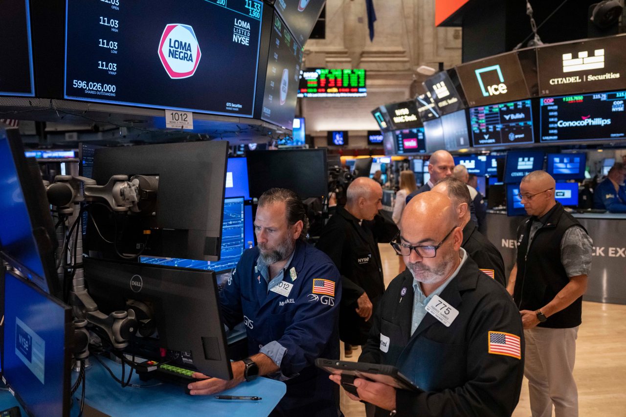 US stocks rise to a record as oil prices drop and inflation gets less bad