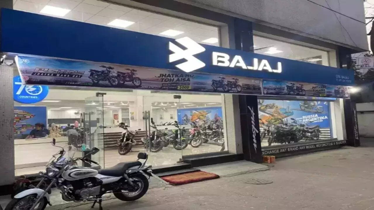 Bajaj Auto shares gain on record Q1 exports, split analyst views