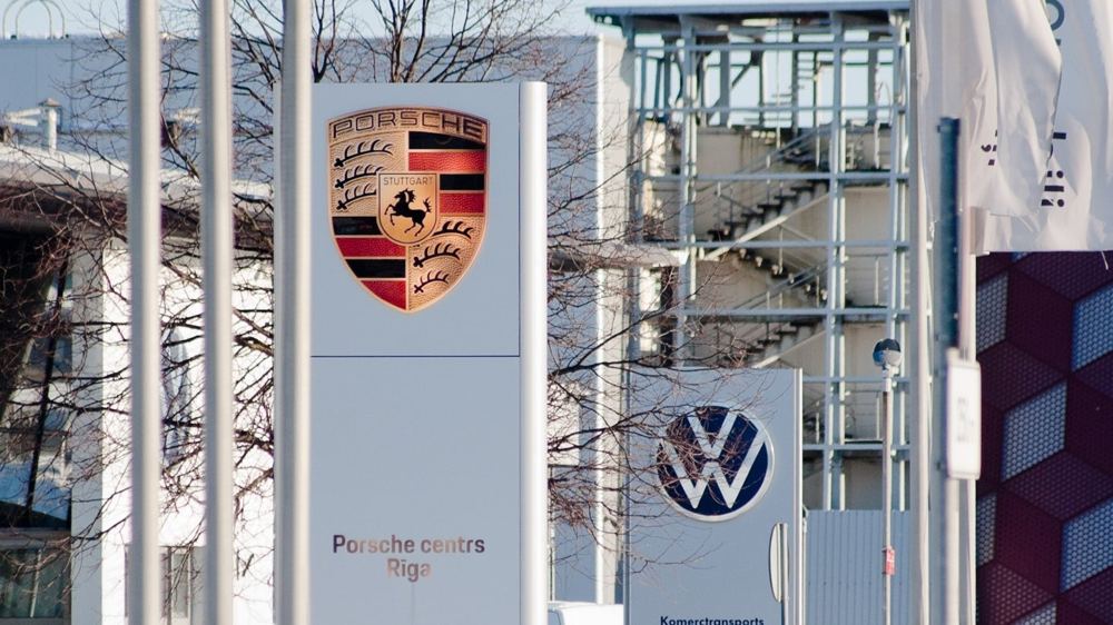 VW cuts 2026 profit outlook on Porsche impairment, China woes
