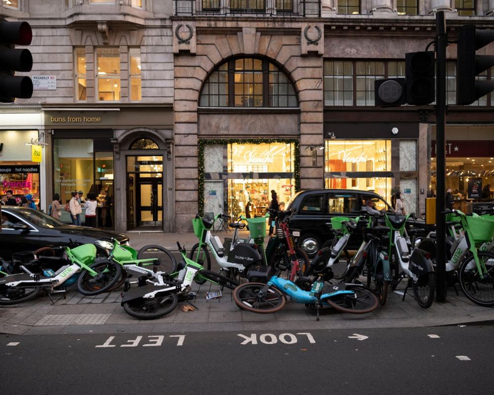 Badly parked ebikes in London are a menace – but other cities have shown us the solution | Agustin Guilisasti