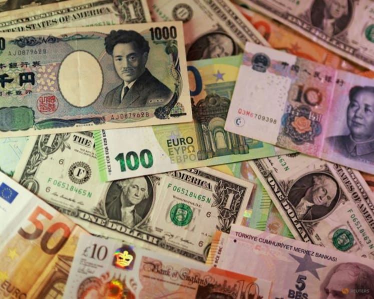 Dollar steady as traders await key US inflation data