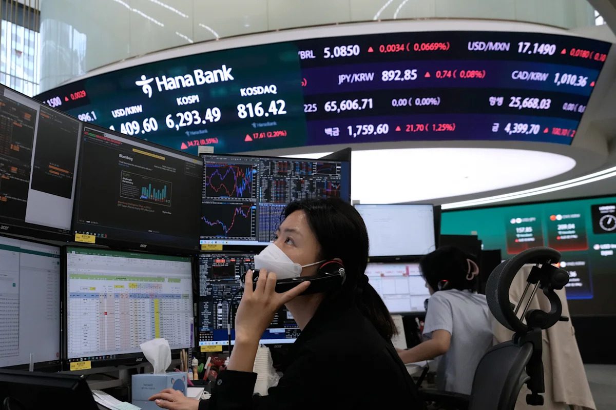 Asian shares track Wall Street gains, while oil prices bounce higher