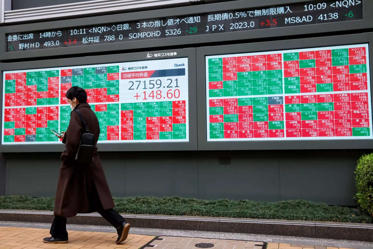 Nikkei edges up on chip shares, BOJ rate fears limit gains