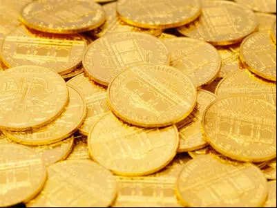 Gold gains as oil slumps after Trump holds off on Iran attack