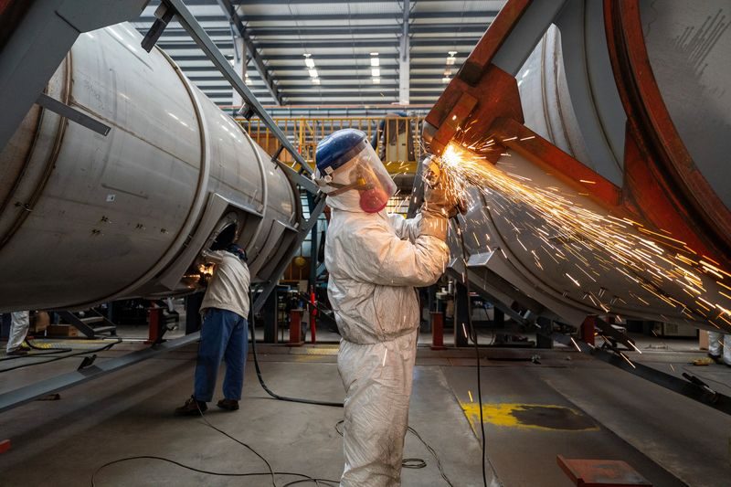 China's industrial profit growth moderates as exports cushion uneven recovery