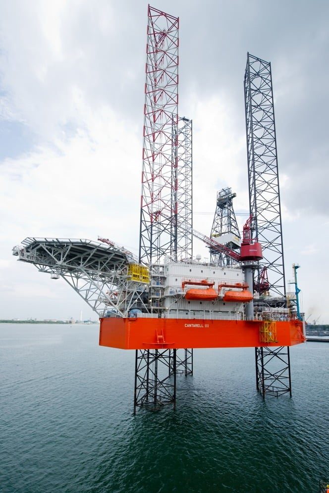 Keppel to divest six operational rigs through new private fund for $936 million