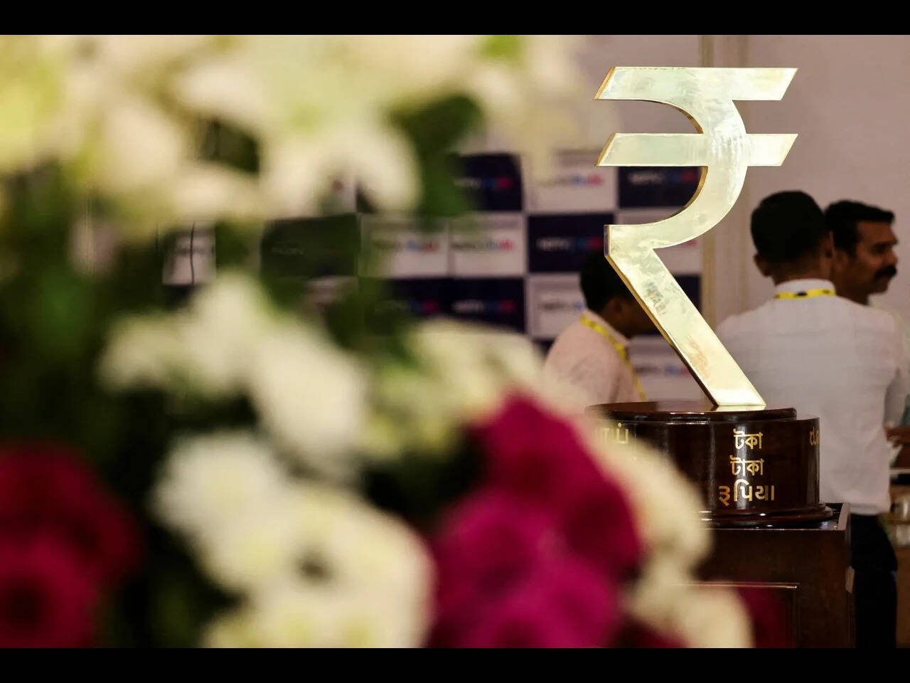 Rupee firms, volatility expectations tick up heading into Fed decision